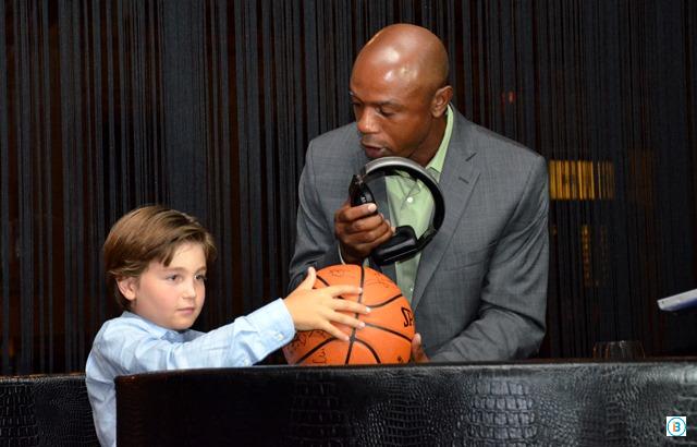 Greg Anthony (former NBA professional and TV sports analyst) presents The Ball of Courage Award to Max Plotkin