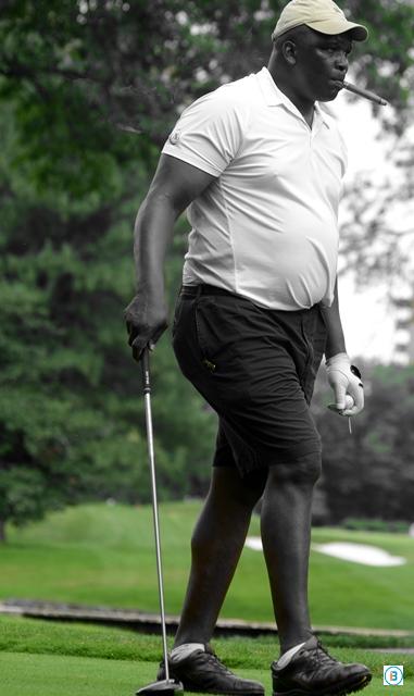Howard Cross Veteran NFL player and Super Bowl Champion, Howard Cross, focuses on his target before striking a shot at the Trent Tucker All for Kids Foundation Celebrity Golf Tournament in New Jersey.