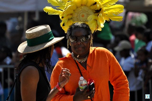 NYC-Parade Two paradegoers engage in an intimate discussion during the 2010 West Indian American Day Parade